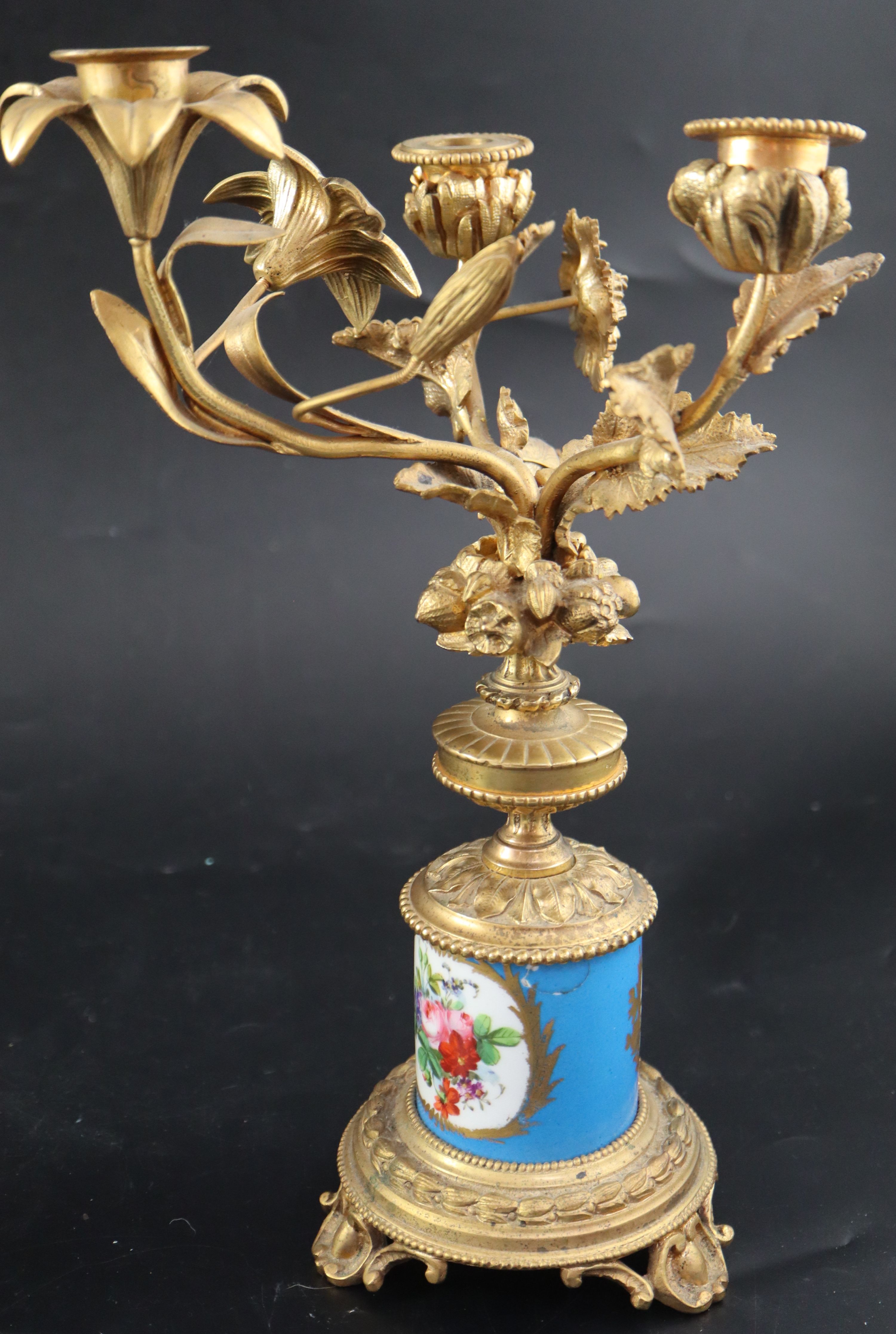A pair of 19th century French ormolu and Sevres style porcelain three light candelabra, height 32cm